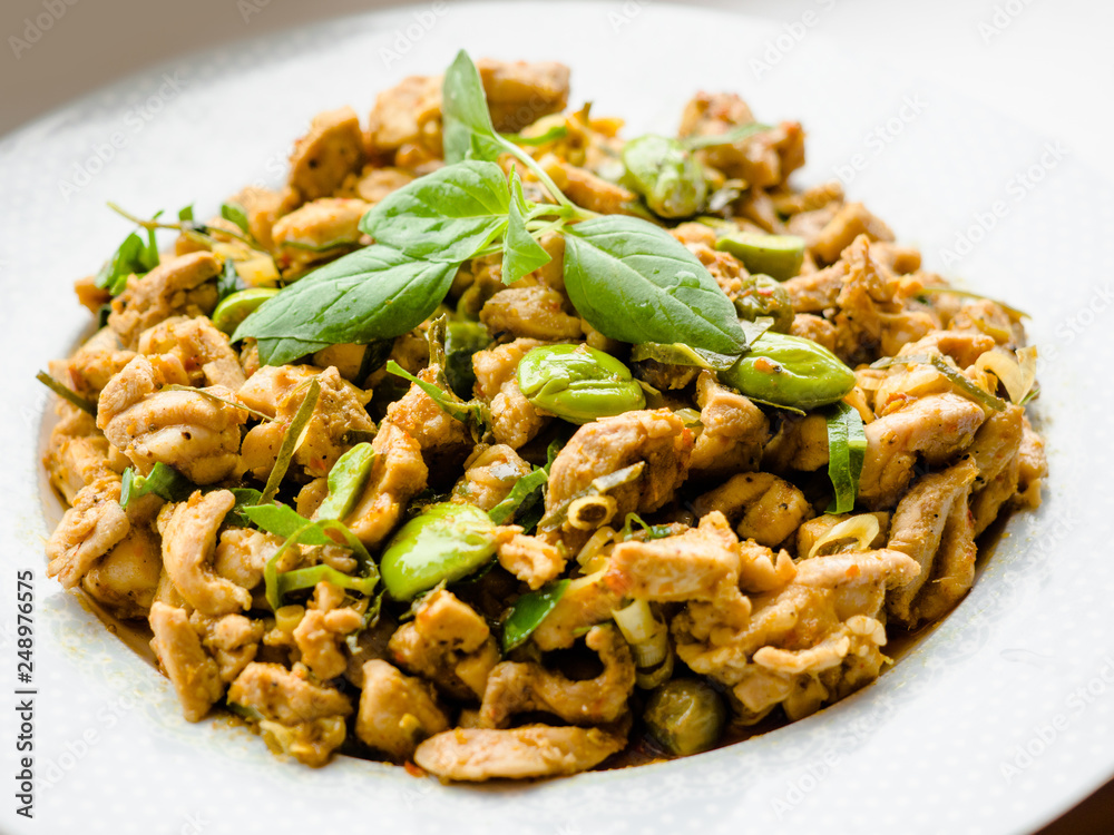 Southern Thai dry curry with chicken Khua Kling with Bitter bean, Twisted cluster bean, Stink bean Southern Thai dry curry with chicken Khua Kling with Bitter bean, Twisted cluster bean, Stink bean