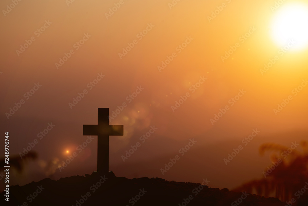 Resurrection concept:Crucifixion Of Jesus Christ Cross At Sunset