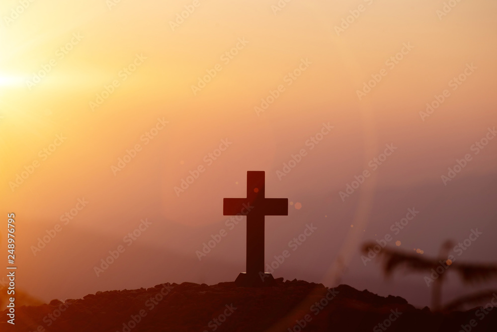 Resurrection concept:Crucifixion Of Jesus Christ Cross At Sunset