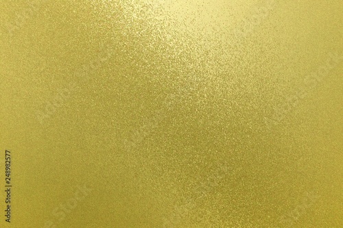 Reflection on rough yellow wall surfaces, abstract background