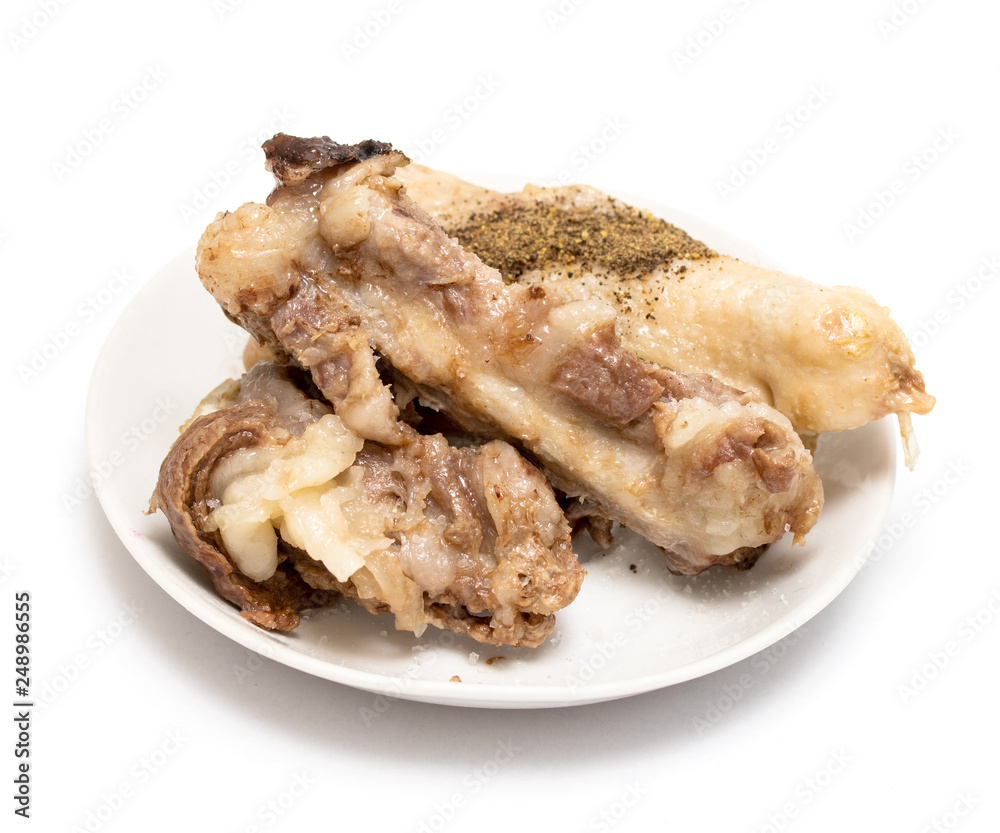bones fried on a plate, white background bones fried on a plate, white background