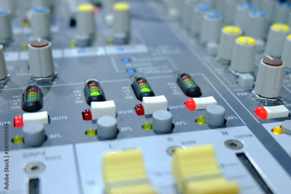 Chiang rai, Thailand - September 20, 2018: mixing console, .Professional audio mixing console with faders and adjusting knobs - radio / TV broadcasting Chiang rai, Thailand - September 20, 2018: mixing console, .Professional audio mixing console with faders and adjusting knobs - radio / TV broadcasting