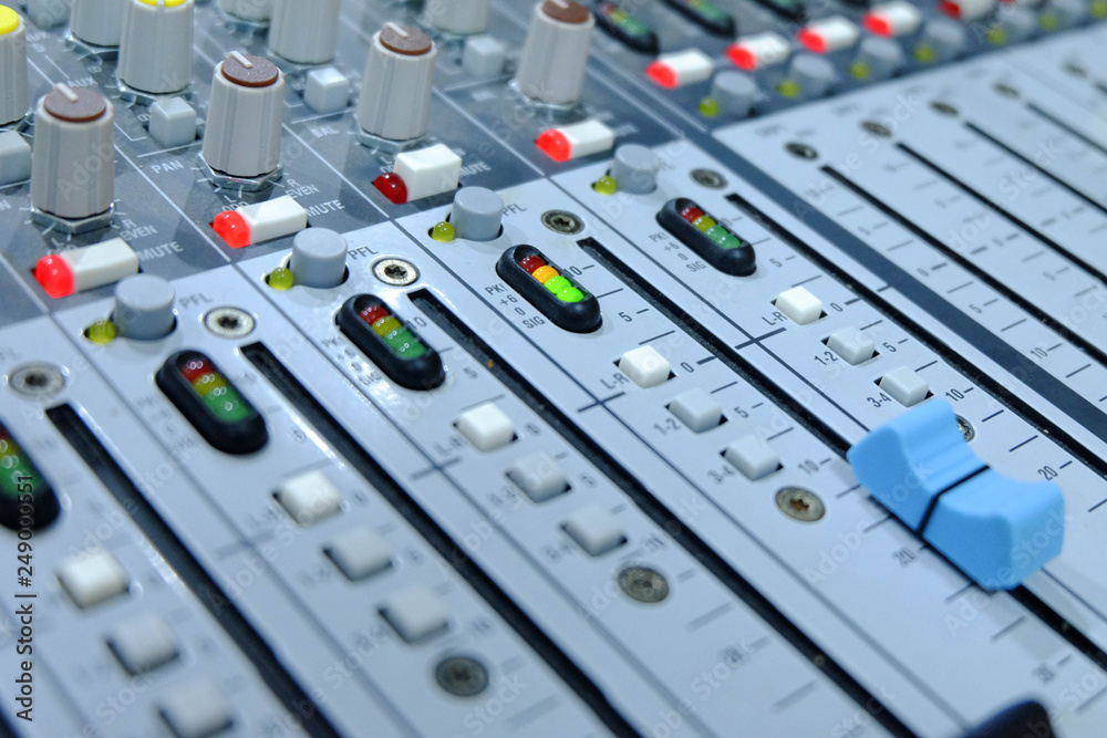 Chiang rai, Thailand - September 20, 2018: mixing console, .Professional audio mixing console with faders and adjusting knobs - radio / TV broadcasting Chiang rai, Thailand - September 20, 2018: mixing console, .Professional audio mixing console with faders and adjusting knobs - radio / TV broadcasting