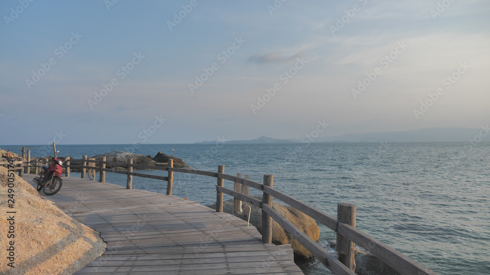 Wooden bridge with sea view