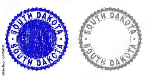 Grunge SOUTH DAKOTA stamp seals isolated on a white background. Rosette seals with distress texture in blue and grey colors. Vector rubber watermark of SOUTH DAKOTA title inside round rosette.