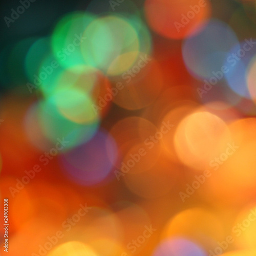 red and yellow abstract blurred glowing lights of different colors © sharan
