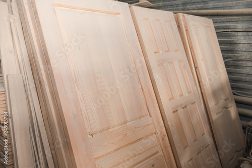 Wooden doors in stock. A lot of wooden doors. Joinery.