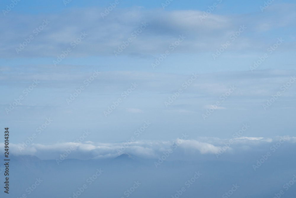 Air clouds in the blue sky in autumn