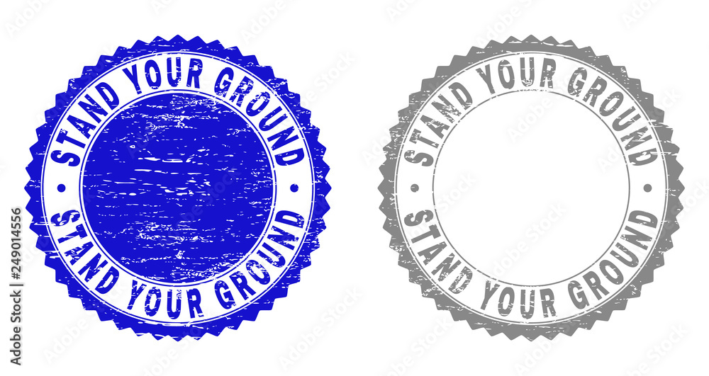 Obraz premium Grunge STAND YOUR GROUND stamp seals isolated on a white background. Rosette seals with grunge texture in blue and grey colors.