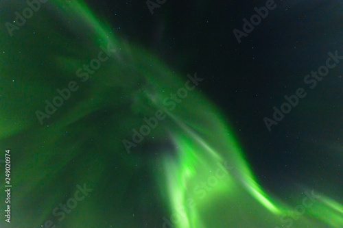 Aurora borealis in the sky. © Moroshka