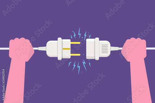 Hand Disconnecting Plug with electricity spark. Vector illustration in flat style photo