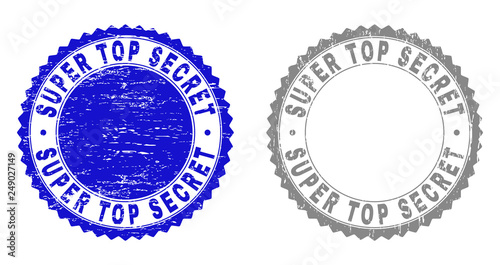 Grunge SUPER TOP SECRET watermarks isolated on a white background. Rosette seals with grunge texture in blue and gray colors.