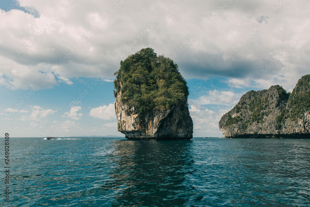 Naklejka premium Phi Phi archipelago, a group of islands in the Andaman Sea in Thailand, without a doubt the most beautiful in the world, attracts millions of tourists