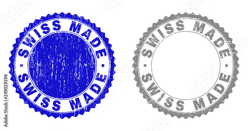 Grunge SWISS MADE stamp seals isolated on a white background. Rosette seals with grunge texture in blue and grey colors. Vector rubber stamp imitation of SWISS MADE caption inside round rosette.