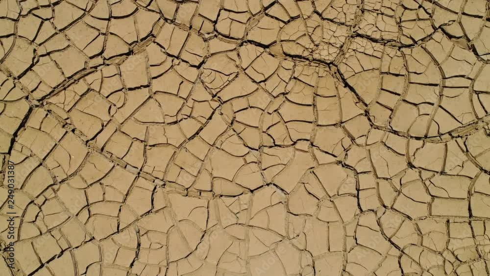 Global Warming: Cracked ground after a heavy rain in a desert. Aerial video Global Warming: Cracked ground after a heavy rain in a desert. Aerial video