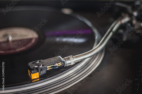 Konstfotografi An old turtable record player and black disc for listening melodious song