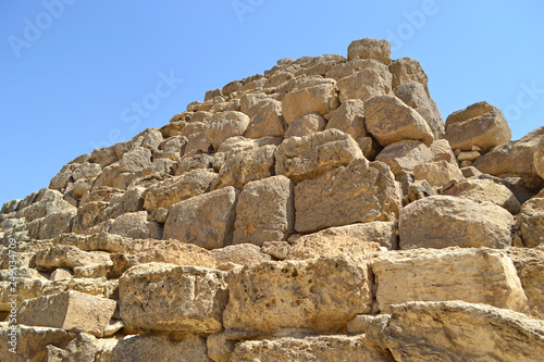 Bottom view of the ancient stones of the great pyramid in Giza. Close view of the pyramid detail.