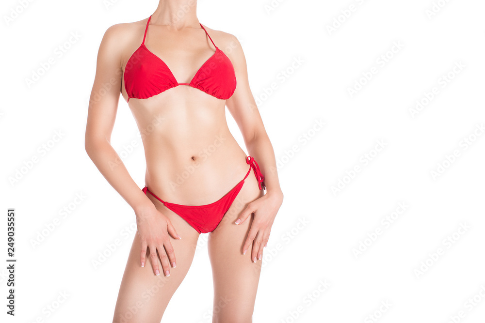 Sexy fit female body in red classic bikini, isolated on white Sexy fit female body in red classic bikini, isolated on white
