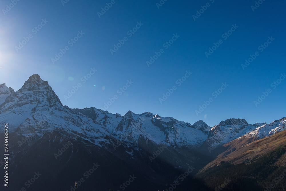 Obraz premium view of the Caucasus mountains, Sunny day, cloudy