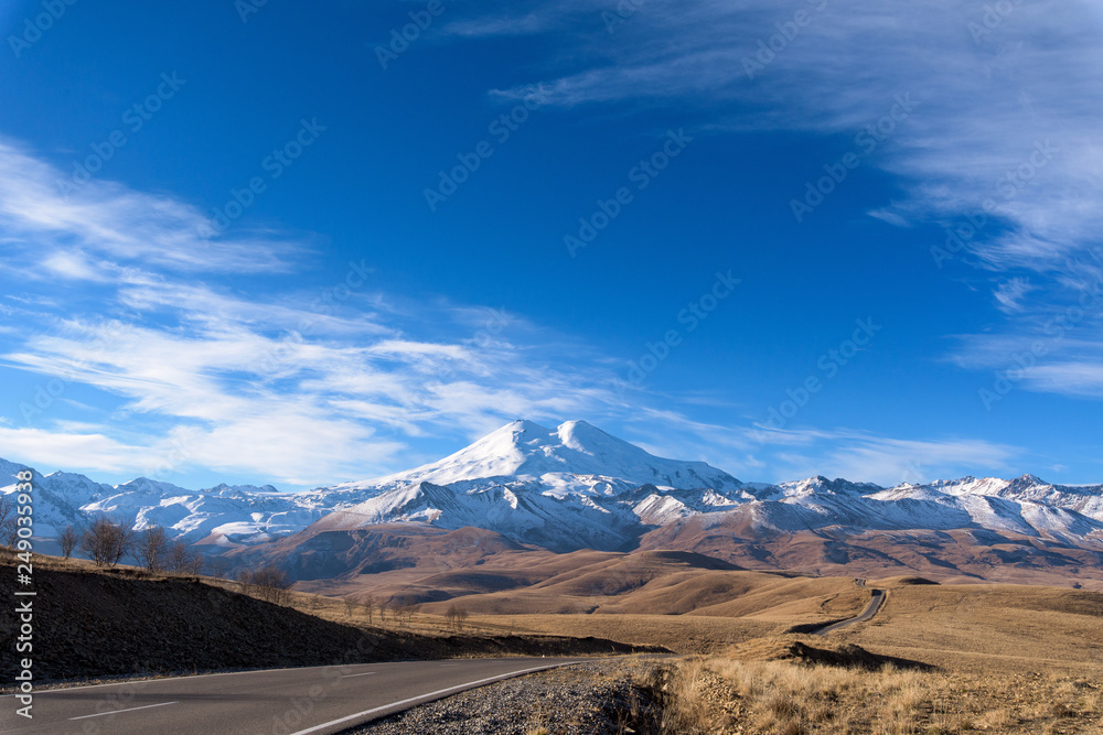 road in the mountains, Caucasus mountains, Elbrus Sunny day, cloudy