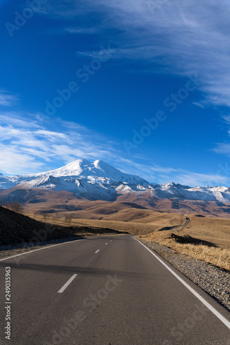 road in the mountains, Caucasus mountains, Elbrus Sunny day, cloudy