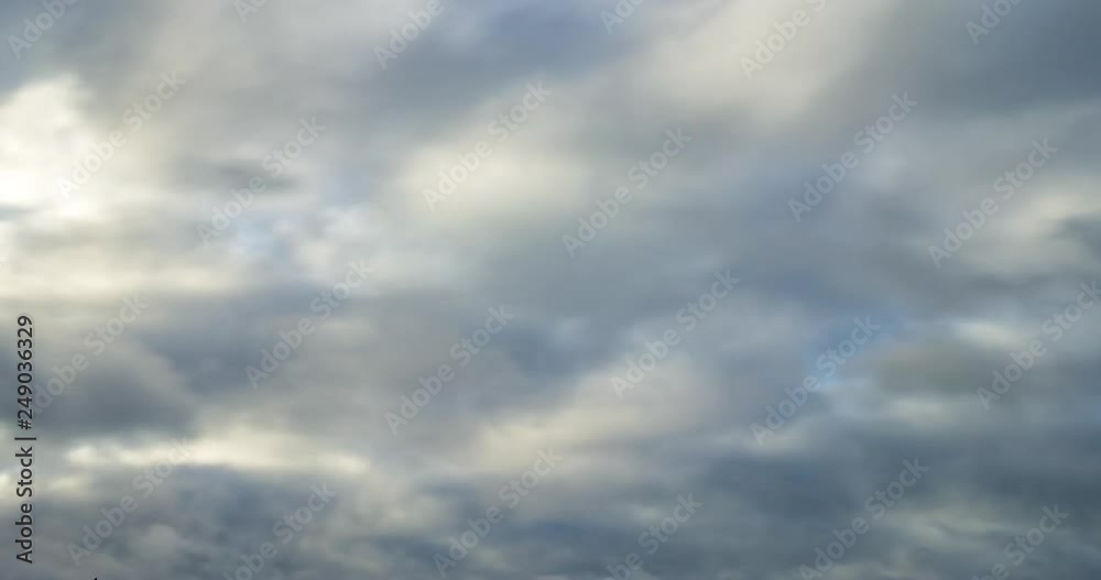 Time lapse clip of grey fluffy curly rolling clouds until storm. strong gale wind Time lapse clip of grey fluffy curly rolling clouds until storm. strong gale wind