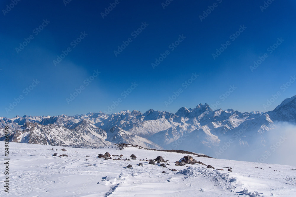 Caucasian mountains in the Elbrus region. partially covered with snow. winter mountain landscape