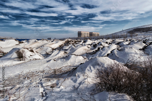 Grunge cityscape. Urban. Dark blue sky. City outskirts. Winter landscape. Ust-Kamenogorsk (Kazakhstan)