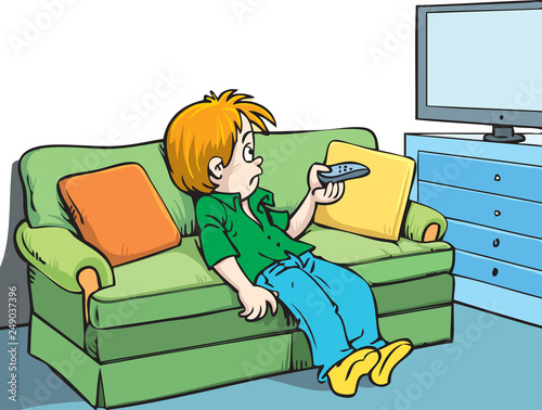 boy lying at sofa and watching tv