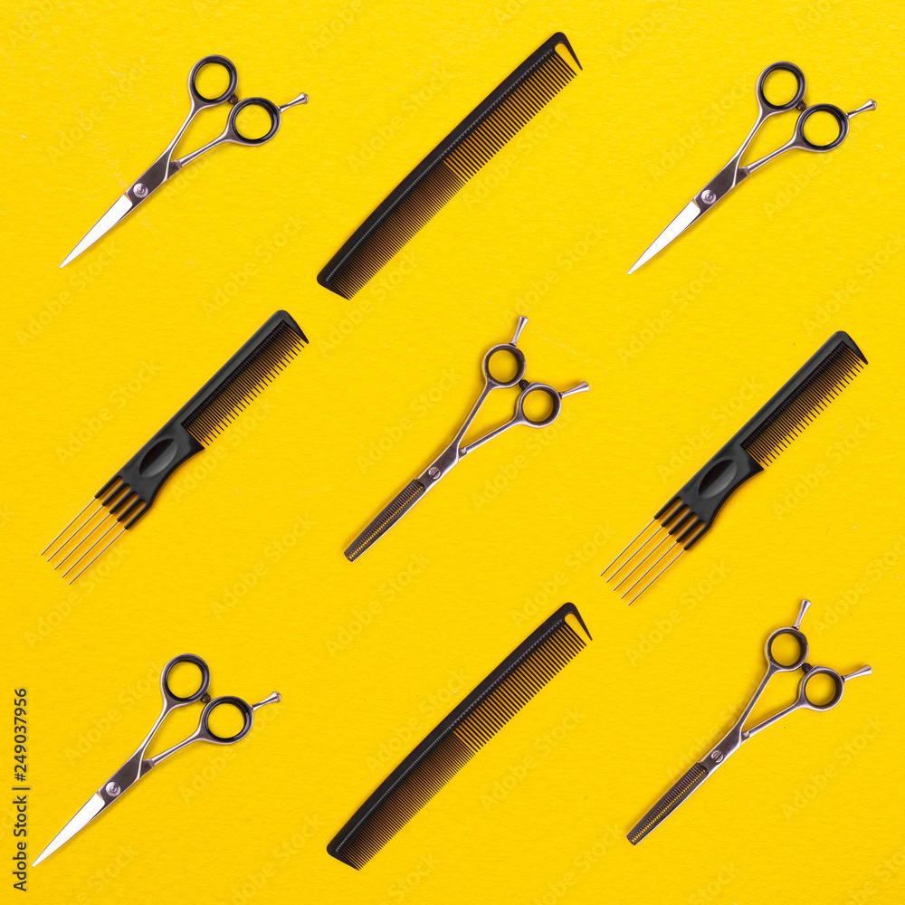 Pattern of combs and hairdresser tools on yellow background top view Pattern of combs and hairdresser tools on yellow background top view