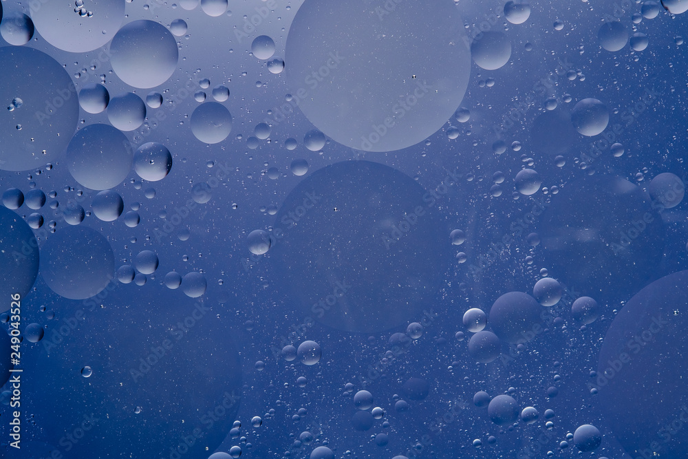 Water oil bubble macro abstract background flow liquid blue white aqua colors