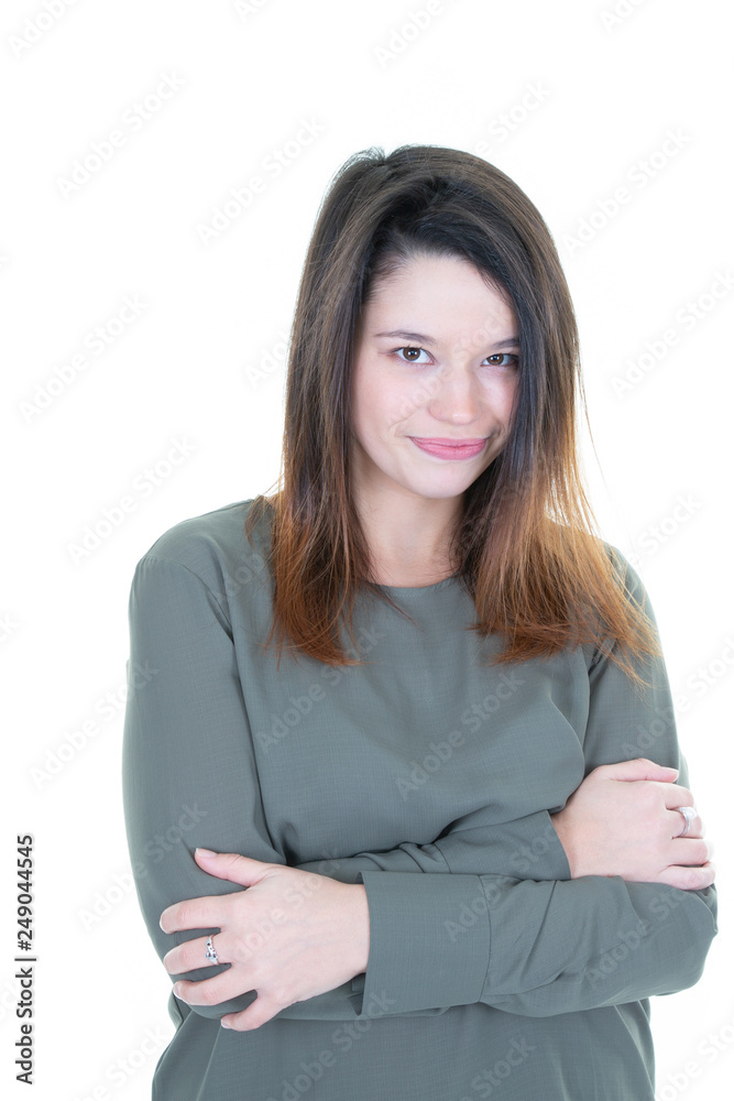 portrait of young happy woman smiling and thinking on white background arms crossed portrait of young happy woman smiling and thinking on white background arms crossed