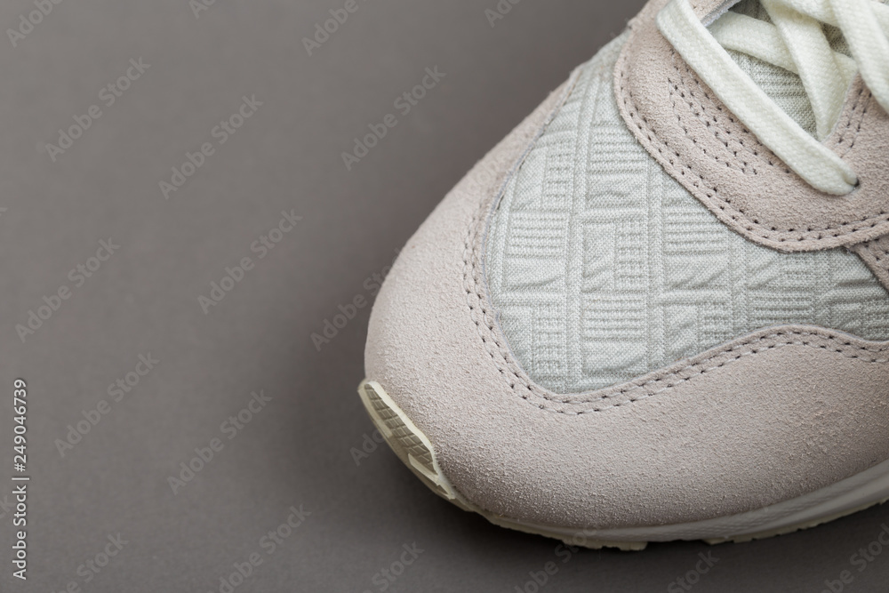 sport shoes with white laces.