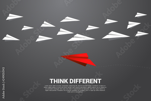 red origami paper airplane go different way from group of white. Business Concept of disruption and vision mission.