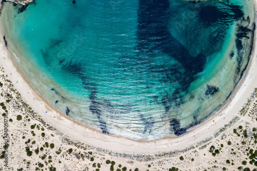 Fototapeta Naklejka Na Ścianę i Meble -  Panoramic aerial view of voidokilia beach, one of the best beaches in mediterranean Europe, beautiful lagoon of Voidokilia from a high point of view, Messinia, Greece