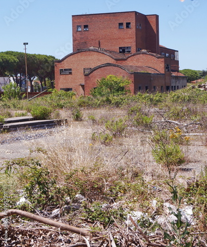 Abandoned sugar factory in Cecina, Tuscany, Italy photo