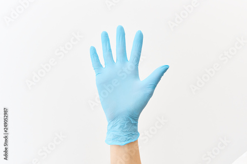Doctor hand gloves © Stas