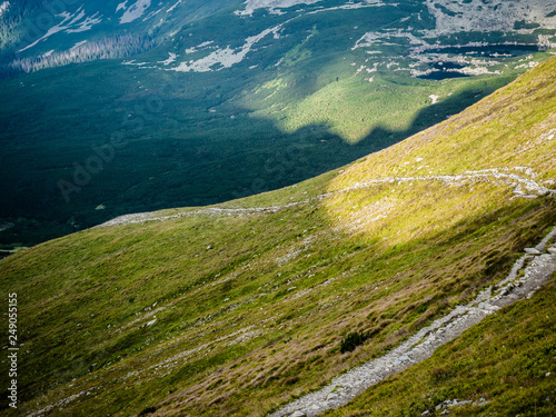 Fototapeta Naklejka Na Ścianę i Meble -  Tatra Mountain part of Carpathian mountain chain in eastern Europe create natural border between Slovakia, Poland. Both protected as national parkland popular destination for winter, summer sports.