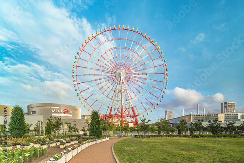 Photography Odaiba colorful tall Palette Town Ferris wheel named Daikanransha visible from the central urban area of Tokyo in the summer blue sky