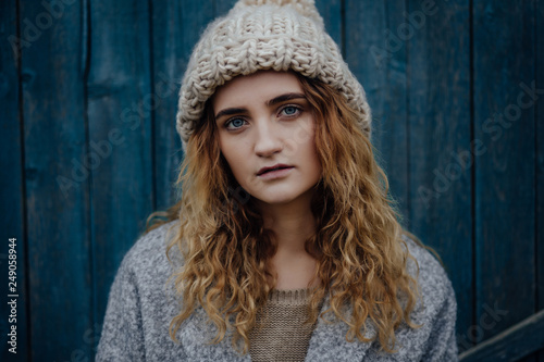 Portrait of young woman in fur hat