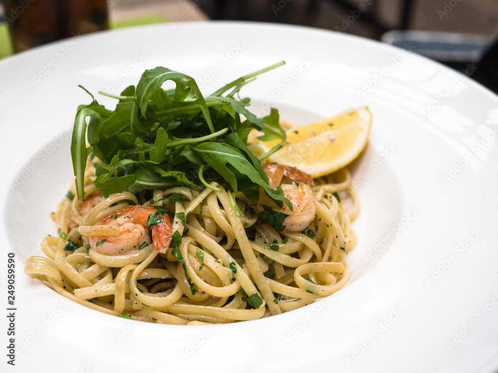 Pasta, spaghetti with shrimps, Italian food.