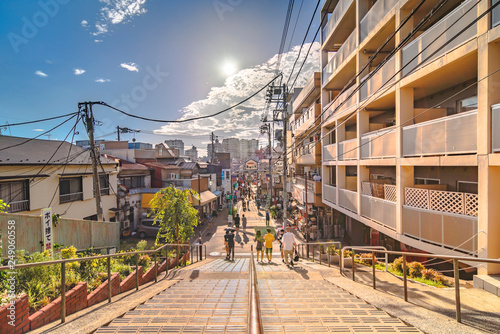 The famous Yuyakedandan stairs which means Dusk Steps at Nishi-Nippori in Tokyo. The landscape overlooking Yanaka Ginza from the top of the stairs is famous as a spectacular spot for sunset.