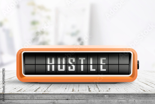 Hustle alarm on a wooden table in a bright room