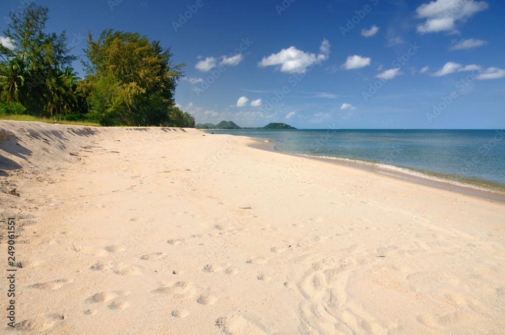 Footprints in white sand of paradise Ban Krut beach at Bang Saphan district of Prachuap Khiri Khan province of Thailand