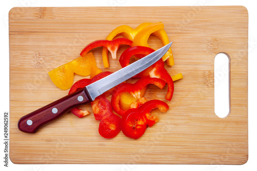 Red and yellow peppers cut into thin slices.