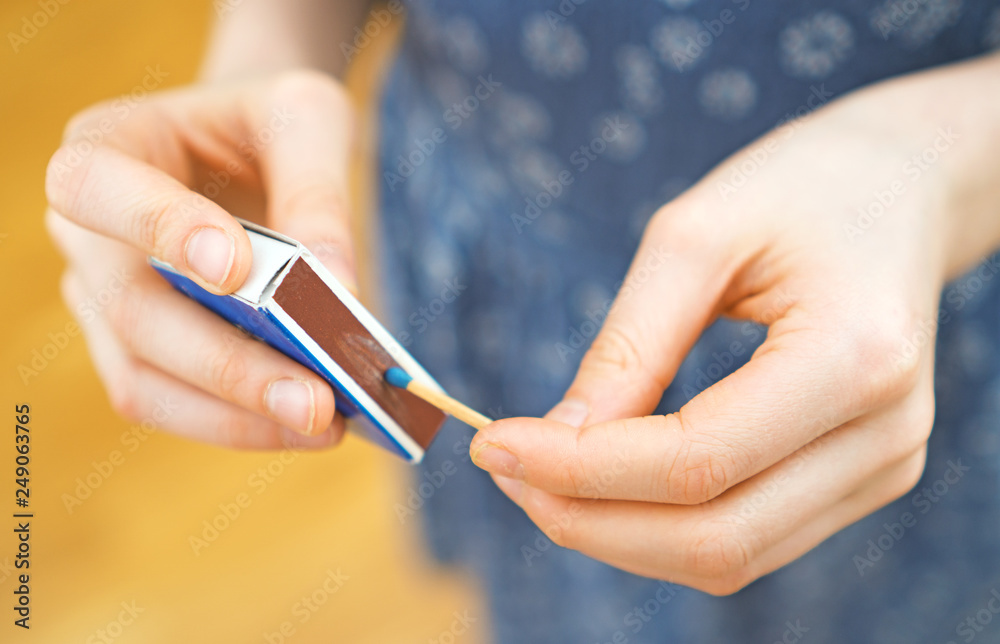 Girl playing with matches. Dangerous situation at home. Girl playing with matches. Dangerous situation at home.