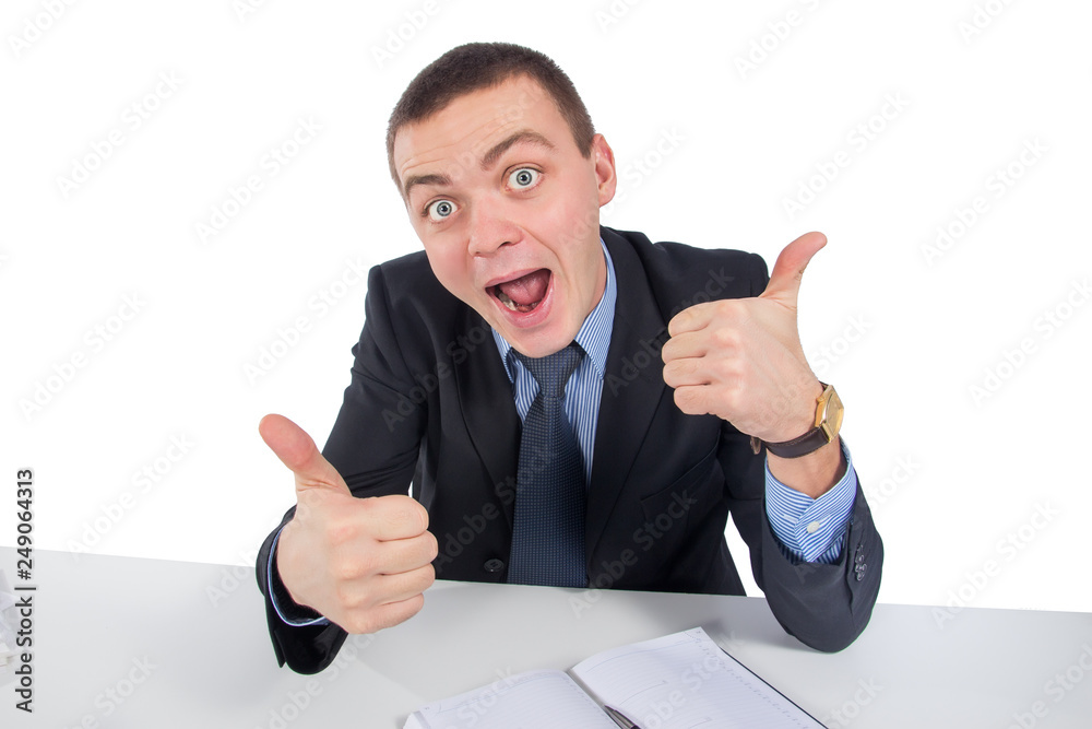 Smiling businessman showing thumbs up sign isolated on white background Smiling businessman showing thumbs up sign isolated on white background