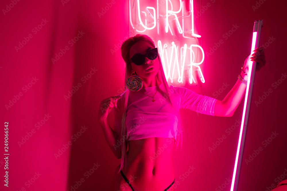 fashion art photo of sexy girl dressed in lingerie in the night-club.  Perfect female body with neon lettering on the background. Night club girl  concept Stock Photo | Adobe Stock