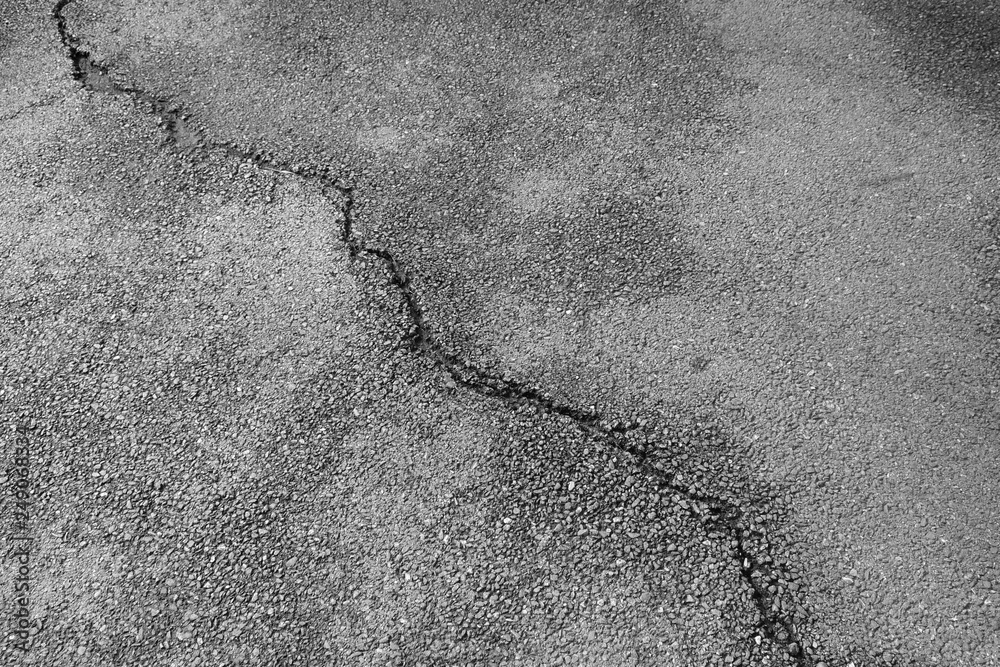 Obraz premium crack asphalt road texture