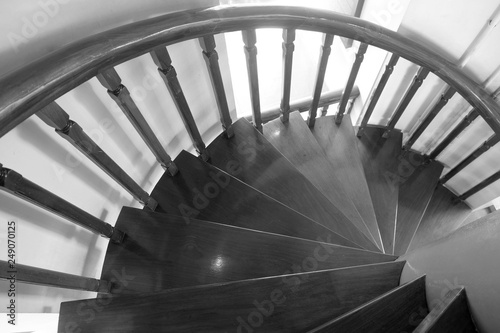 black and white high angle shot of wood stairway